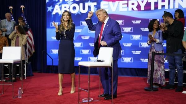 Do<em></em>nald Trump dancing to the song 'YMCA' with South Dakota Governor Kristi Noem during a town hall event in Pennsylvania