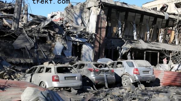 Damaged cars and destroyed buildings after Russian missiles hit Odesa, Ukraine yesterday