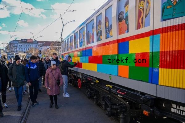 Visitors look at a full-size tram built from classic Lego bricks by Hungarian artist Balazs Doczy at Deak Ferenc Square in downtown Budapest on November 21, 2024. — AFP pic 